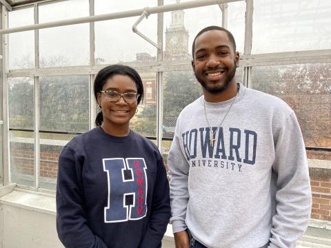 Environmental Studies students Ziyan Spears and Alexandra Grayson are wearing Howard sweatshirts and smiling at the camera.