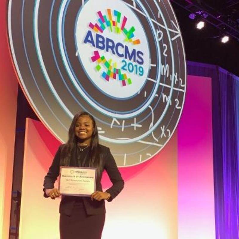 Student at ES Conference being Awarded